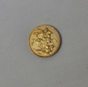 A Victorian gold sovereign dated 1881