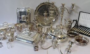 A pair of electroplated entree dishes together with other entree dishes and covers, candlesticks,