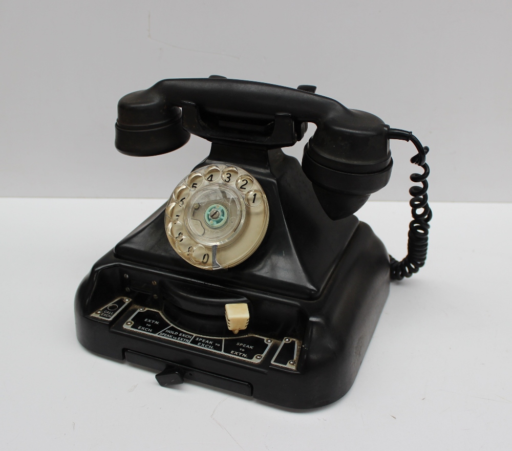 A Bakelite bell-set no.44 telephone, with a selector