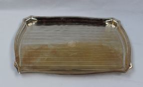 A George V silver tray of rectangular shaped form with line decoration, Birmingham, 1917, 28.5 x