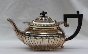 An Edwardian silver teapot with a reeded body, London, 1903, Josiah Williams & Co (George Maudsley
