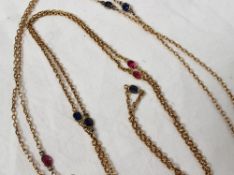 A sapphire and ruby yellow metal long chain, 155cm long