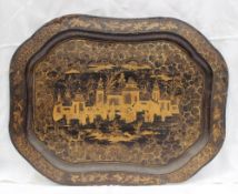 A papier mache tray decorated with a chinoiserie scene highlighted in gilt decoration, 61 x 49cm