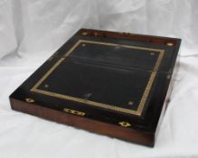 A Victorian walnut laptop desk of rectangular form with brass stringing, leather inset writing