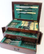An electroplated part flatware service in a mahogany two drawer case