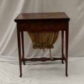 A late Victorian / Edwardian rosewood card table, the rectangular fold over top with a baize