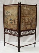 A Chinese Chippendale style two fold screen, with turned finials, inset with painted oriental scenes