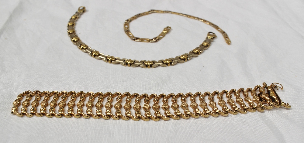 An 18ct yellow gold bracelet with textured links together with two other 18ct yellow and white