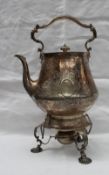 A Victorian silver kettle on stand of large proportions with a scrolling handle, the baluster body