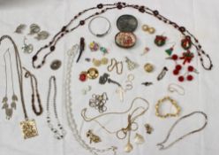 Assorted costume jewellery including necklaces, earrings, bracelets, brooches, oval brass tin, dress