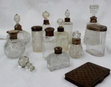 A George V silver topped and faceted glass dressing table pot, London, 1916, together with a