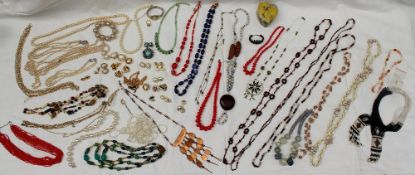 Assorted costume jewellery including necklaces, wristwatch, earrings, brooches etc