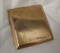 A 9ct yellow gold cigarette case with engine turned decoration inscribed "E Greenwood",