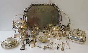 An electroplated three piece tea set together with a tea kettle on stand, a large twin handled tray,