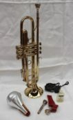 A Blessing L-1 brass trumpet, contained within a lined case