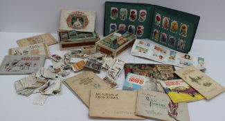 A large collection of cigarette cards including Wills Household Hints, Players Tennis, Players