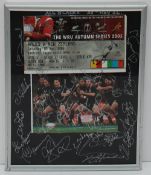 A framed montage depicting the Wales V New Zealand ticket 5th November 2006 and a photograph of