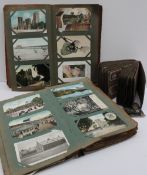 Two postcard albums containing circa 400 postcards including portrait cards, scenes of Barry,