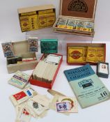 A large collection of loose cigarette cards, including Players Film Stars, Twinings Rare Stamps,