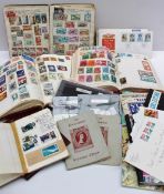 Three stamp albums together with stock books, first day covers, loose world stamps etc