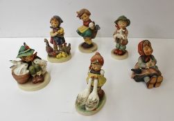 Six Goebel figures by M.J Hummel, including Happy Pastime, Goose girl, Bashful, etc