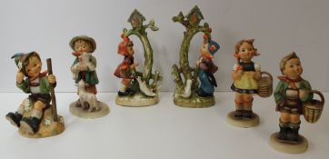 Six Goebel figures by M.J Hummel including Village Boy, Sister etc