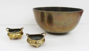 A large Chinese bronze bowl, with mark to the base, 25.5cm diameter together with a pair of small