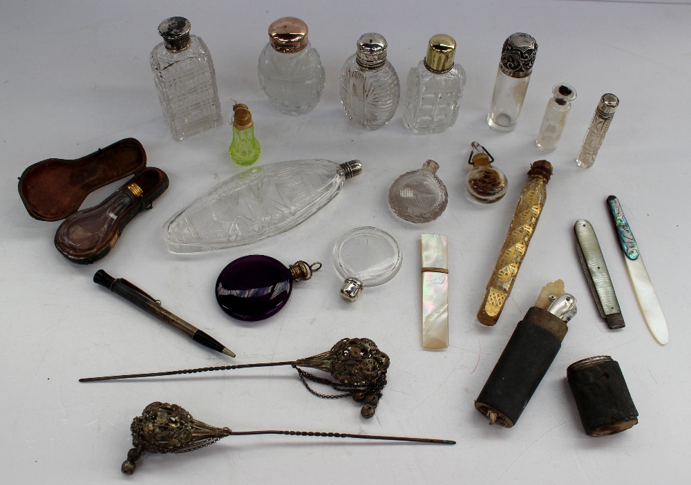 A silver topped and glass scent bottle together with assorted metal and glass scent bottles, hat
