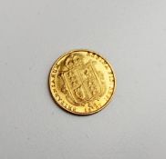 A Victorian shield back gold half sovereign dated 1887