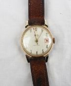 A Smiths gentleman`s wristwatch, the silvered dial with Arabic numerals and date aperture at 3 o`