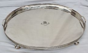 An electroplated gallery tray of oval form with a pierced rim and Gulston crest to the centre, 62.