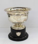 An Elizabeth II silver trophy cup, of usual form, on an ebonised base, inscribed "The Tom Thomas