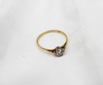 A solitaire diamond ring, the brilliant cut stone approximately 0.25 of a carat to a white metal