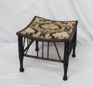 A mahogany Thebes stool, the square top with a reeded edge on four ring turned legs, a spindle