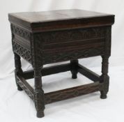 An 18th century and later oak box stool, the square top with a moulded plank top, the body carved
