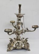 An electroplated table centrepiece with a central holder and three dish holders, the base