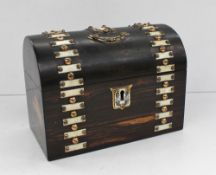 A Victorian coromandel stationery box of domed form with ivory panels and stud work, 19.5cm wide x