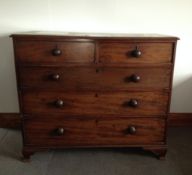 A Victorian mahogany chest, the rectangular top above two short and three long graduated drawers