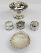 A George V silver pedestal bowl with a panelled side on a spreading foot, Sheffield, 1910,