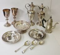 A pair of Mappin and Webb electroplated ecclesiastical wine ewers with similar goblets, tazza,