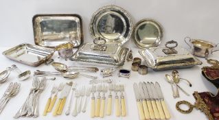 A pair of electroplated entree dishes and covers together with another entree dish and cover,
