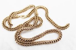 A 9ct yellow gold long chain of twisted oval form, approximately 56 grams