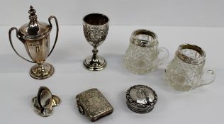 A George V silver miniature trophy cup, embossed with scrolls and leaves, inscribed "Ashampstead