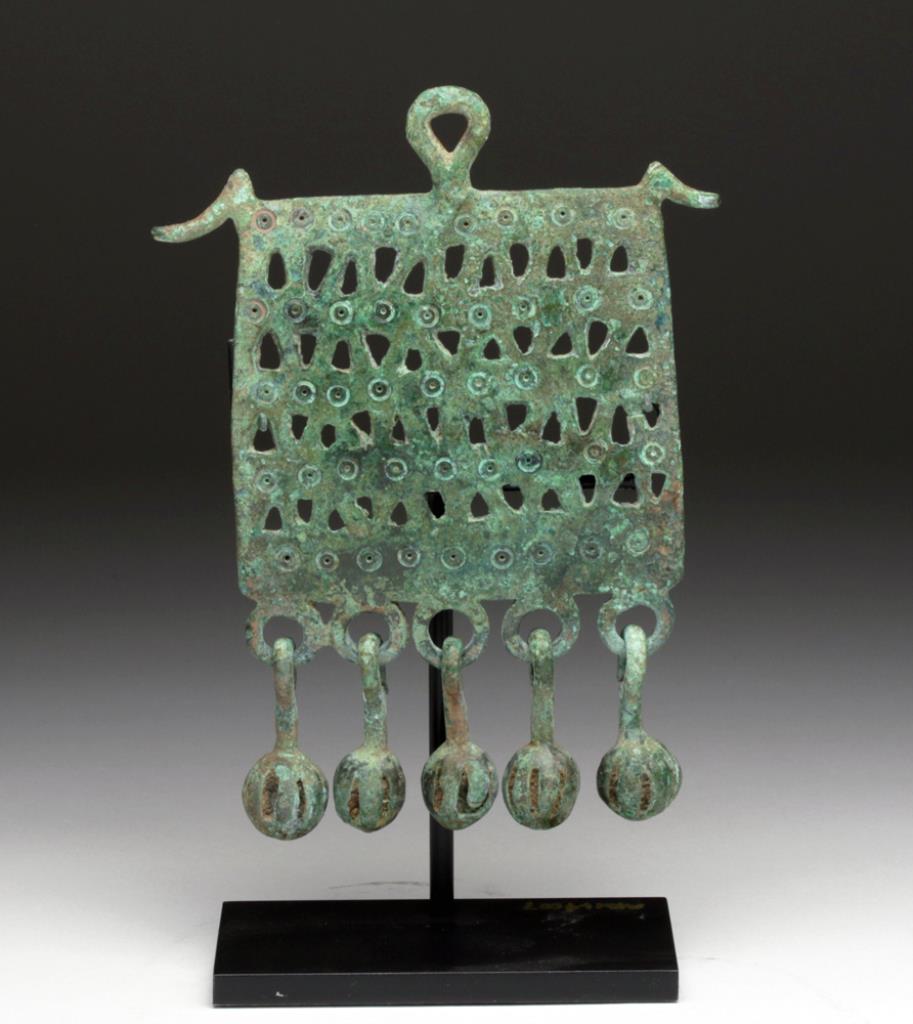 Greek Geometric Bronze Pectoral, Dangling Bells  Greece, Geometric Period, ca. 800 BCE. A cast