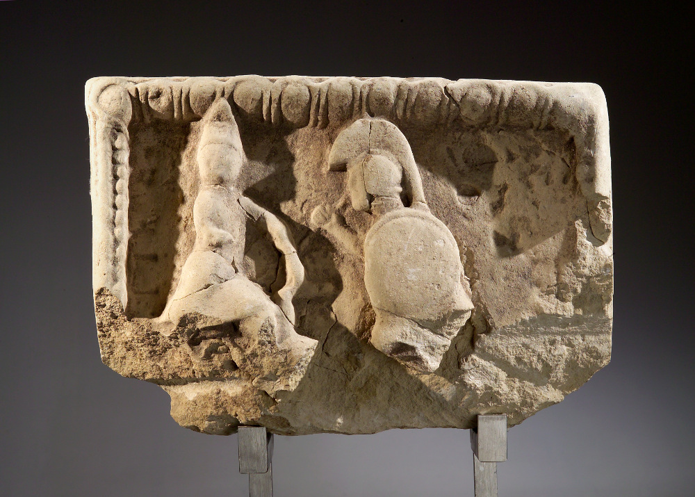 Greek Limestone Metope Fragment, Fighting Warriors  Greater Greece, 1st half 6th century BCE.