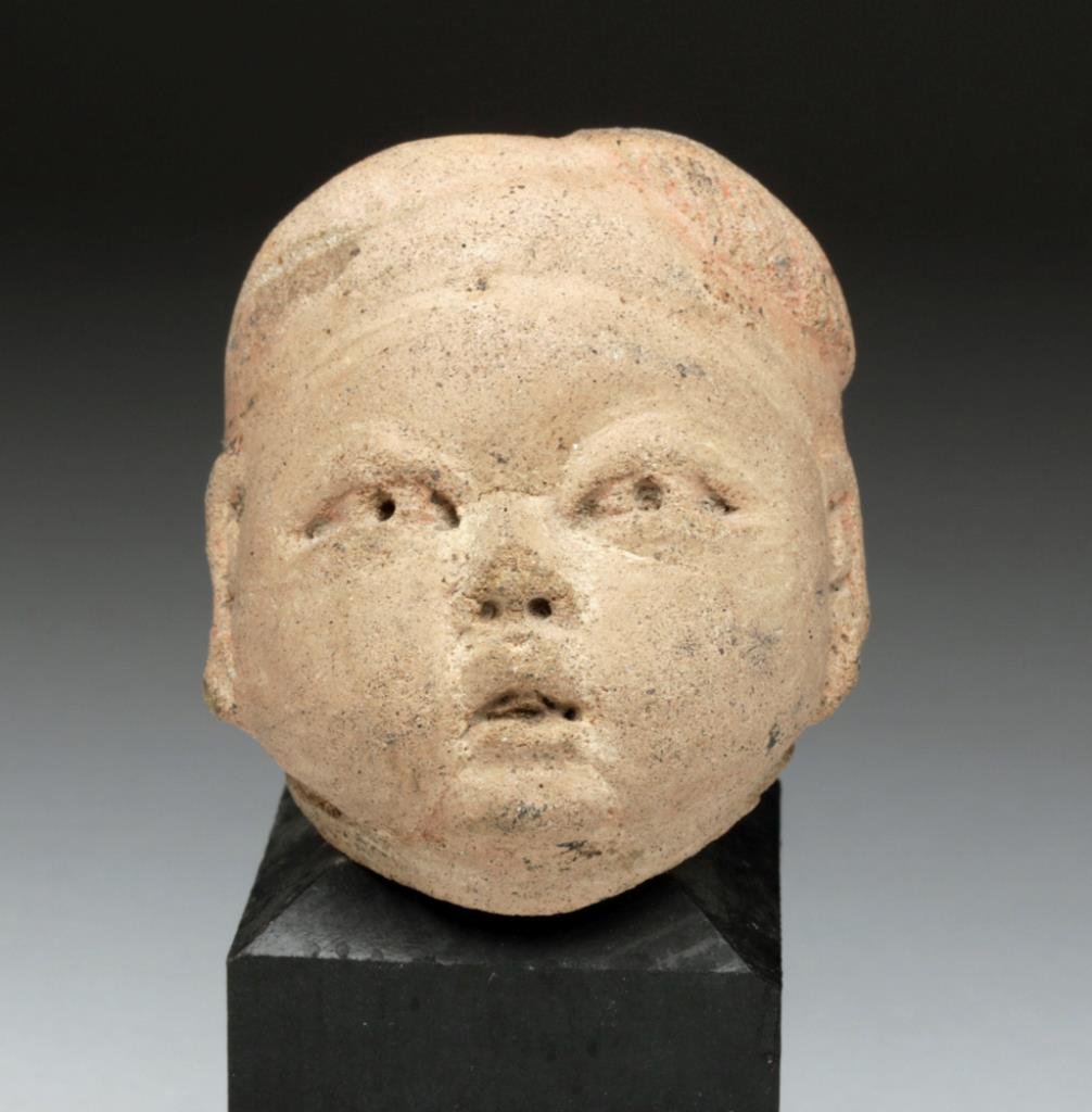 Pre-Columbian Olmec Baby Head  Pre-Columbian, Mexico, Olmec culture, 12th - 9th c. BCE.  One of