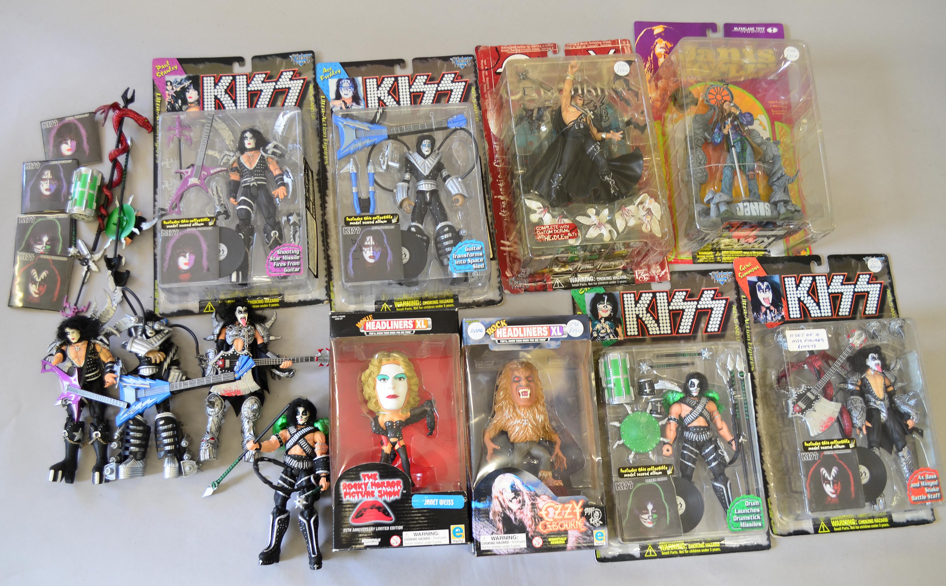 McFarlane Kiss action figures: carded Gene Simmons; carded Peter Criss; carded Paul Stanley;