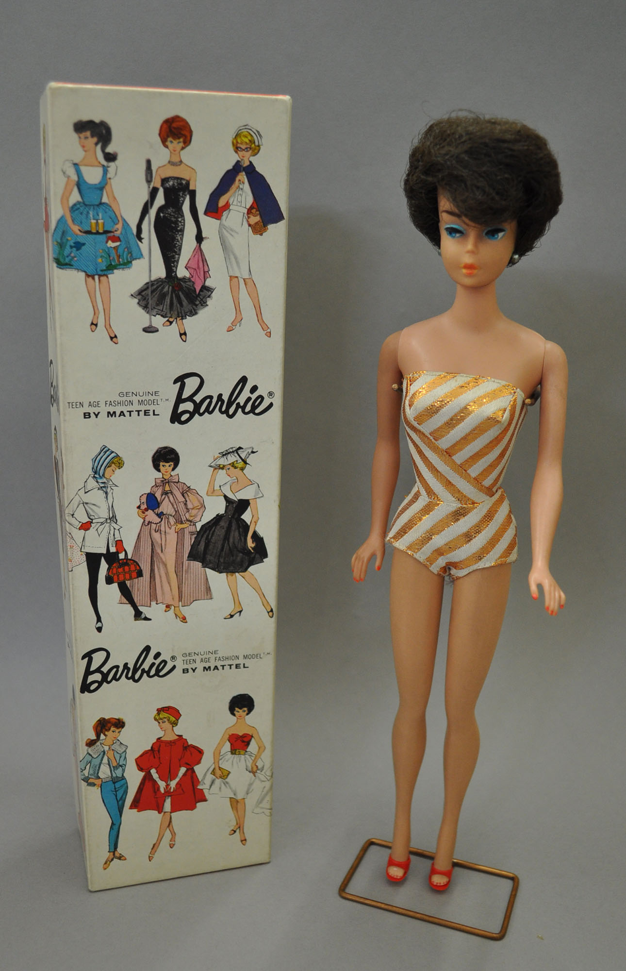 Mattel #850 Bubble-Cut Barbie (Japan): brunette Barbie with side-glancing blue eyes, coral lips,