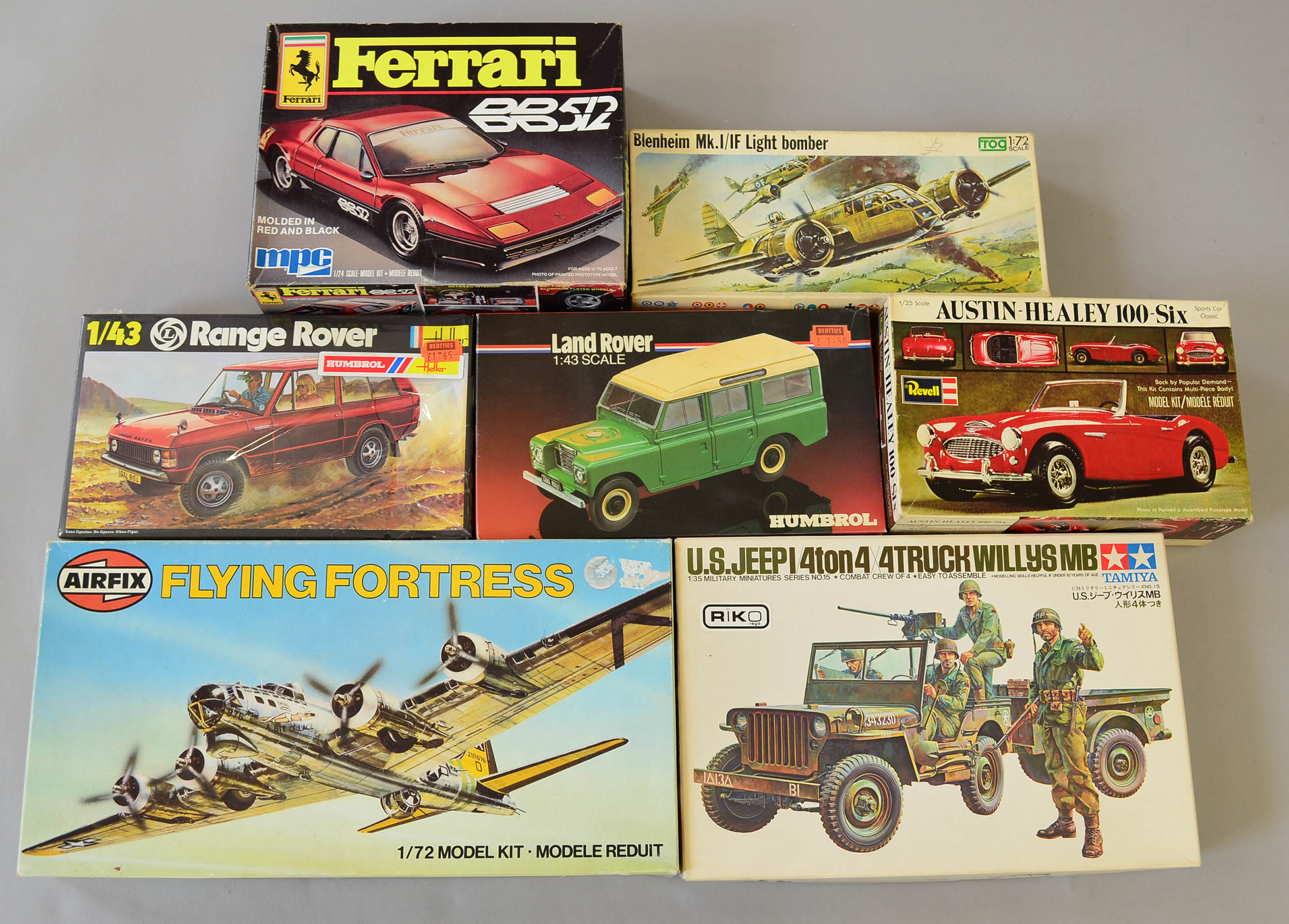 Seven assorted plastic model kits: Airfix Flying Fortress; Humbrol Land Rover; Revell Austin-Healey