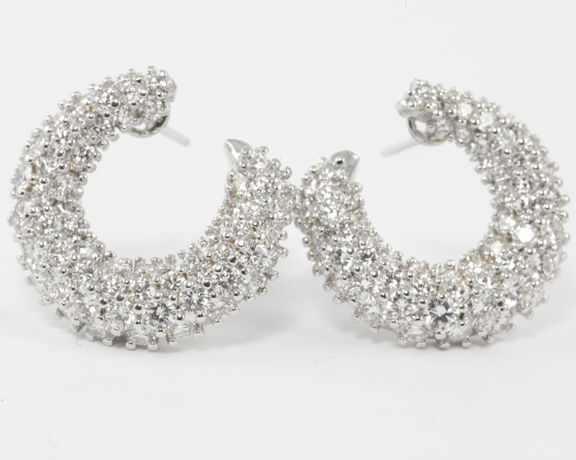 GARRARD - Pair of 18ct diamond crescent earrings, with round brilliant cut diamonds in a yellow